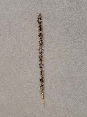 Florenza gold-tone filigree bracelet featuring marquise-cut rhinestone